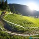 Alutech-Fahrer Daniel Gottschall in der Wiesenkurve beim Prolog